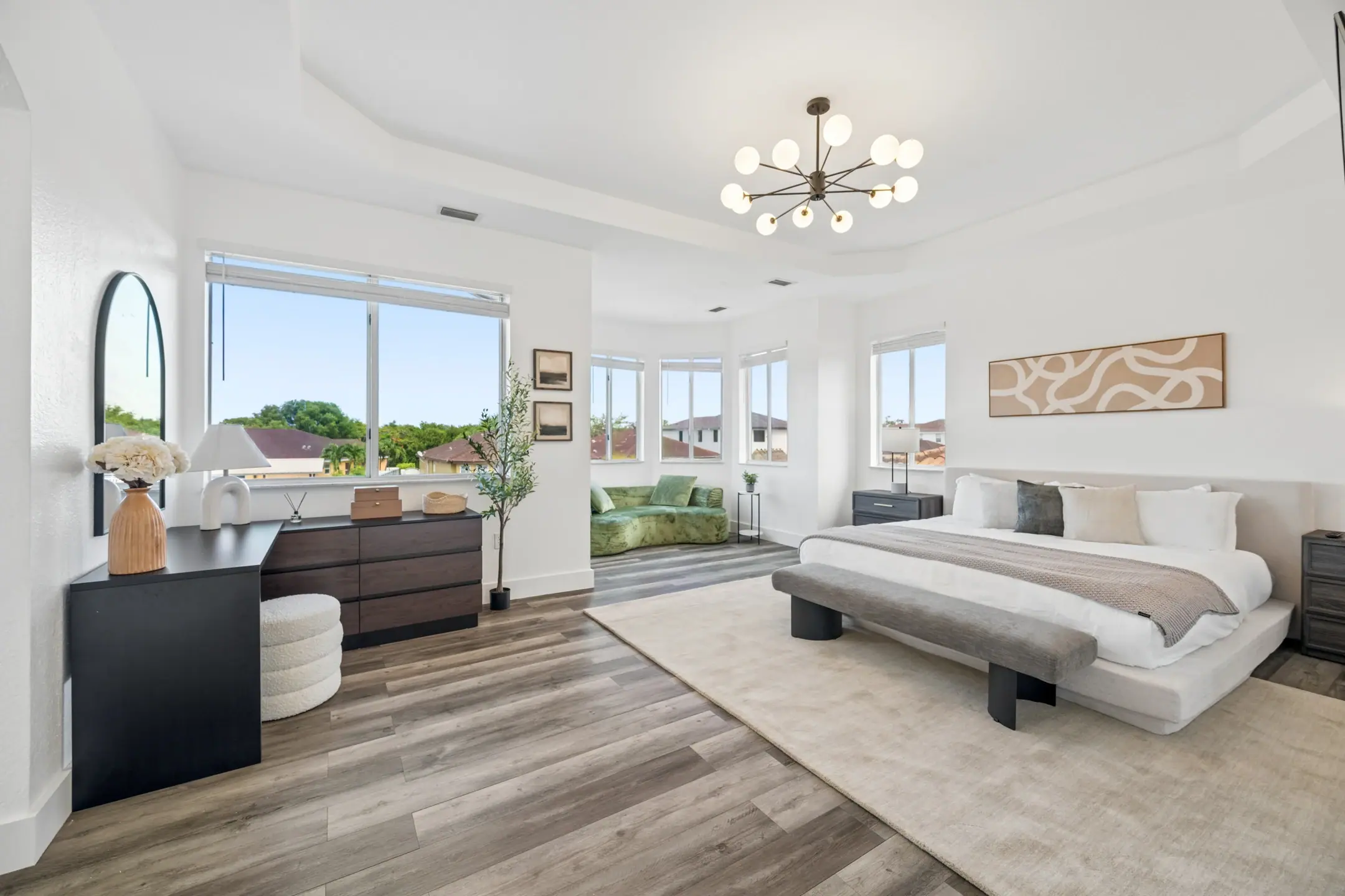 Primary bedroom at the Hammocks Residence