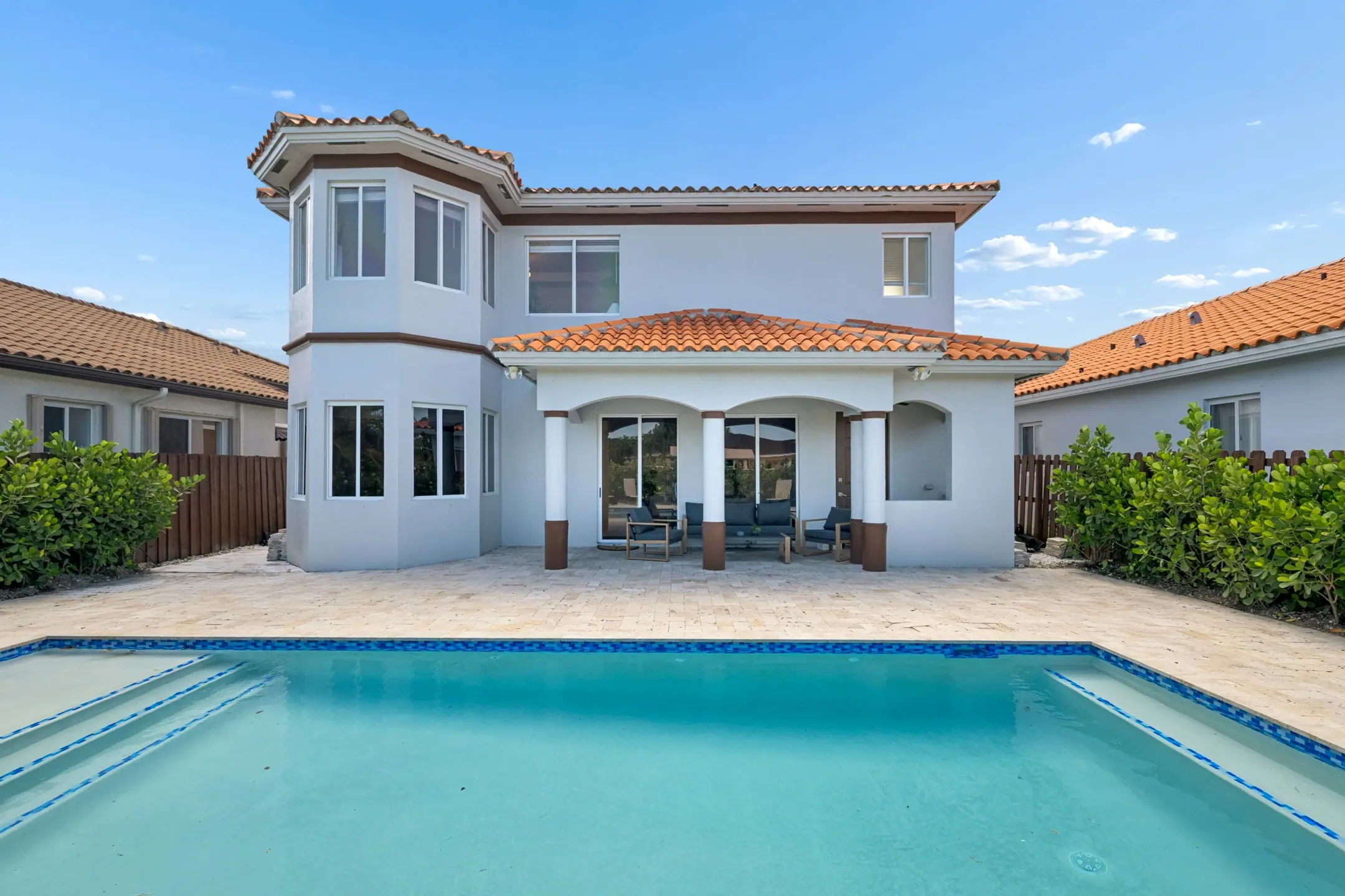 Pool and deck at the Hammocks Residence