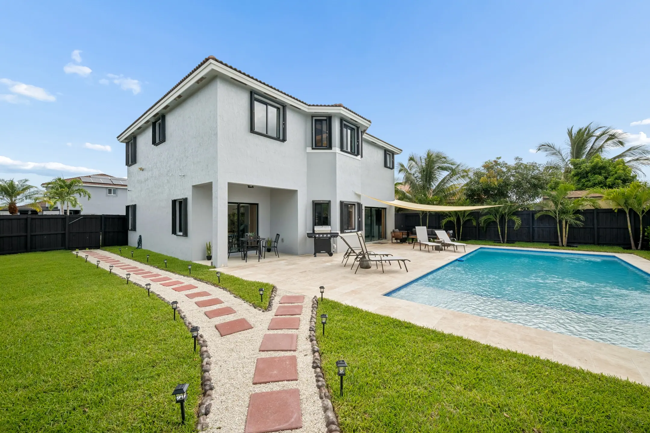 Pool and rear elevation of the Homestead Pool Home